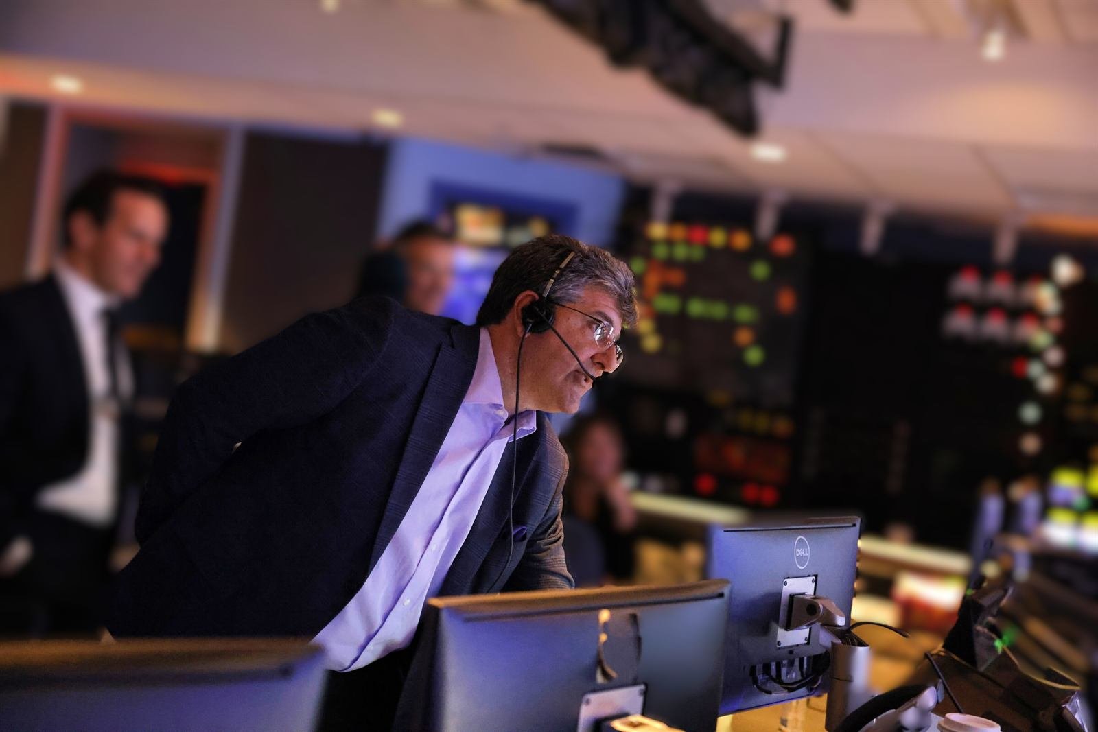 Guy Campanile monitoring a live broadcast from inside a television control room