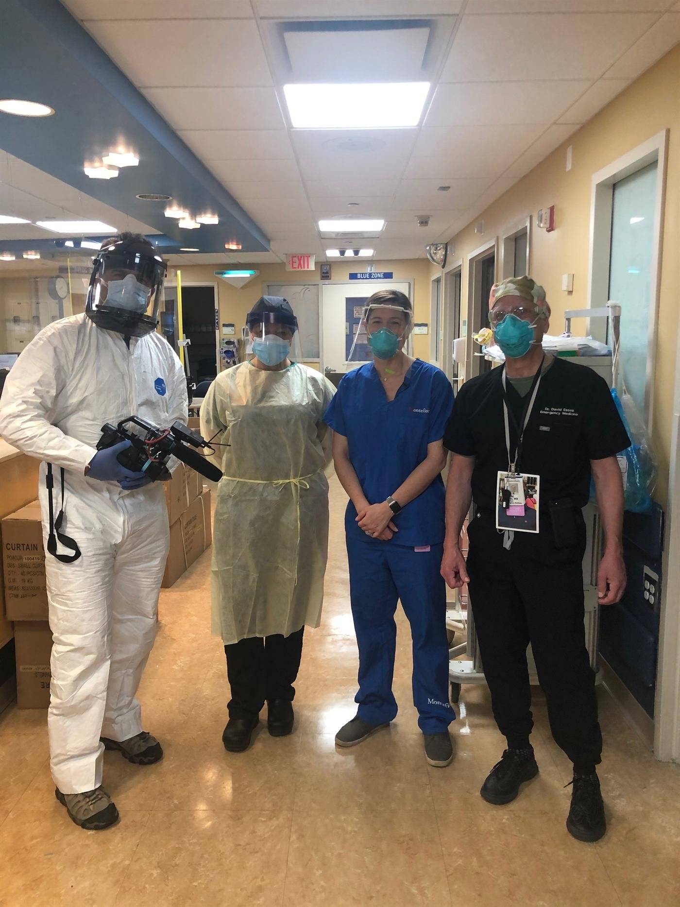 Guy Campanile in protective equipment reporting from inside a hospital during the COVID-19 pandemic